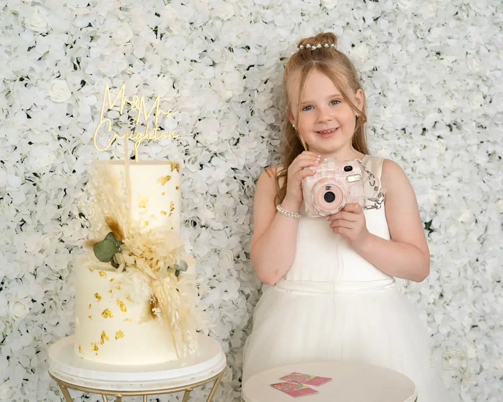 wedding photo backdrop pitcher and piano