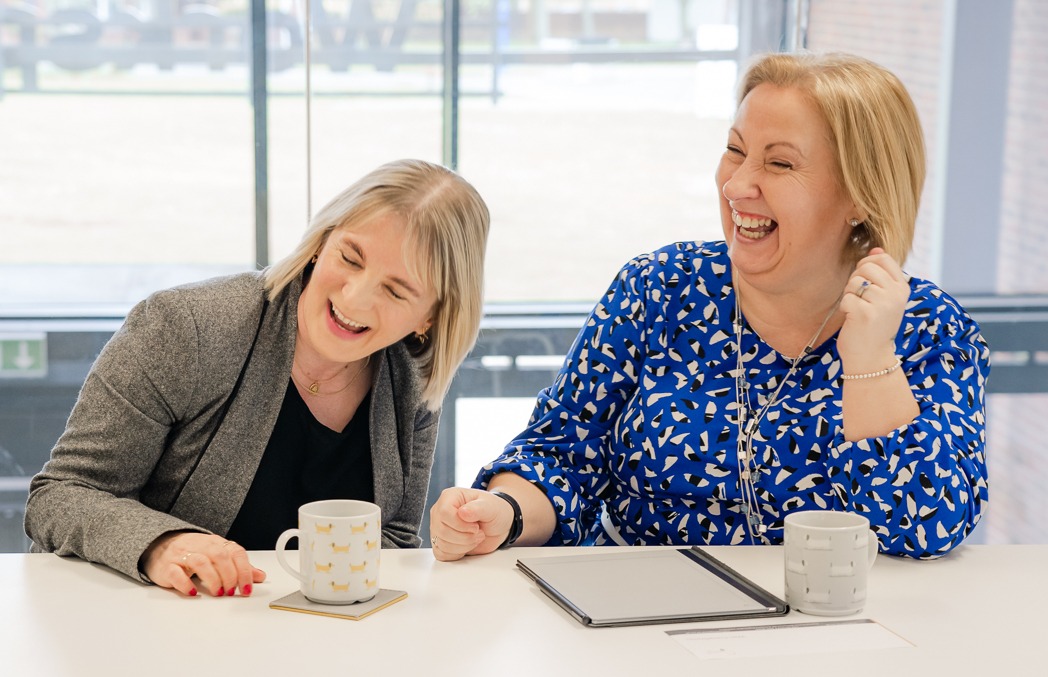 behind the scenes of 2 HR advisors working together in their office laughing and interacting, having a brand photoshoot in Blyth, HR business, inspired HR